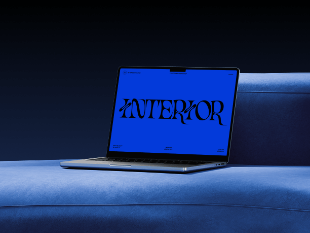 macbook mockup on blue bench in dark room