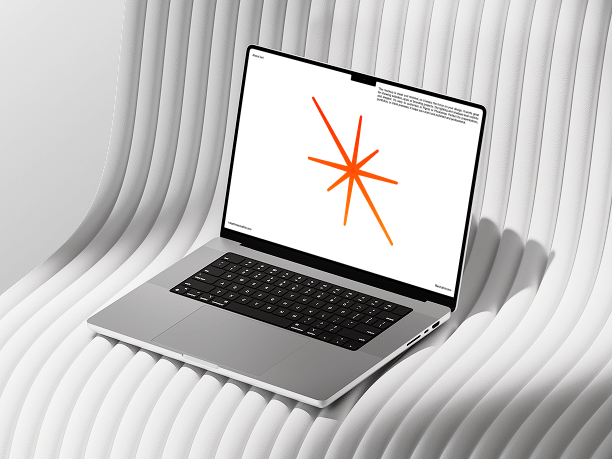 macbook mockup on curved white chair