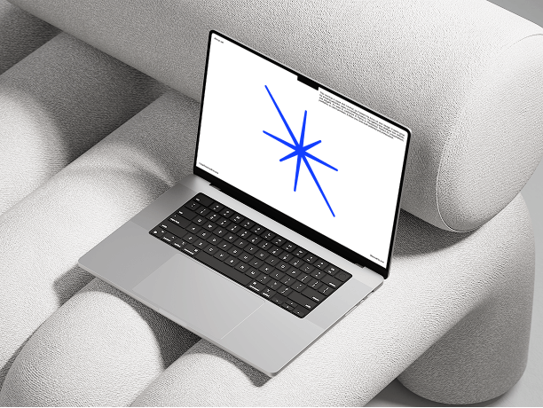 macbook mockup on soft white sofa
