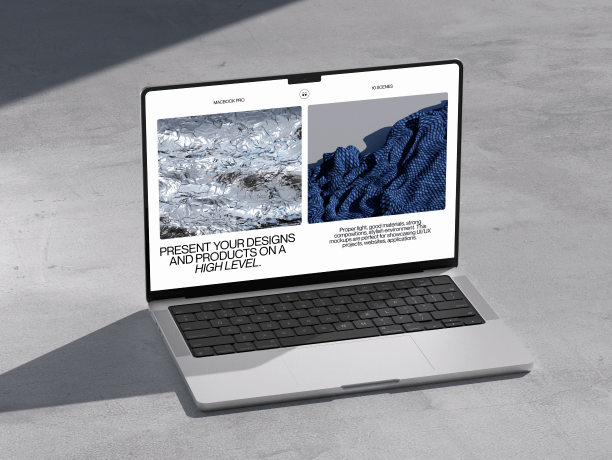 macbook pro mockup on concrete floor