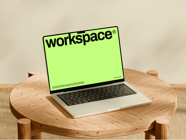 laptop mockup on round wooden table