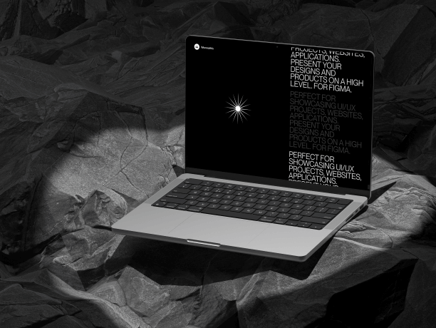 macbook pro mockup on rocky surface