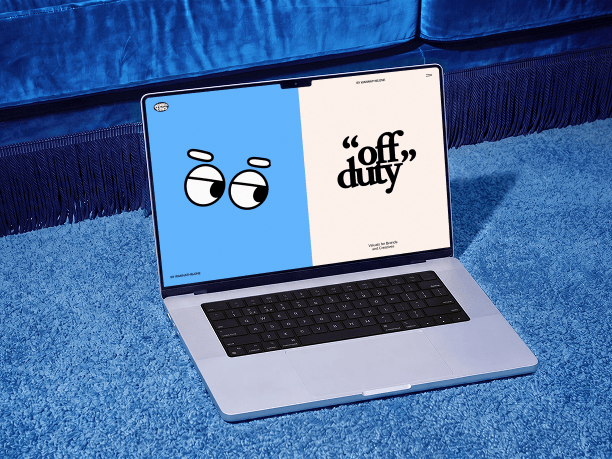 macbook mockup on a carpet by a sofa