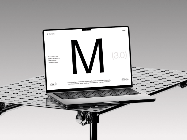 macbook pro on a metal table