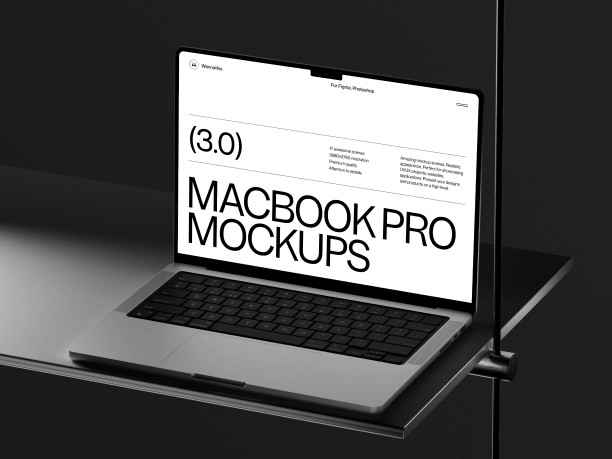 macbook pro on a metal shelf