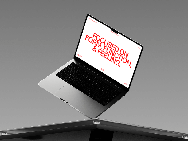 floating macbook mockup on light grey background