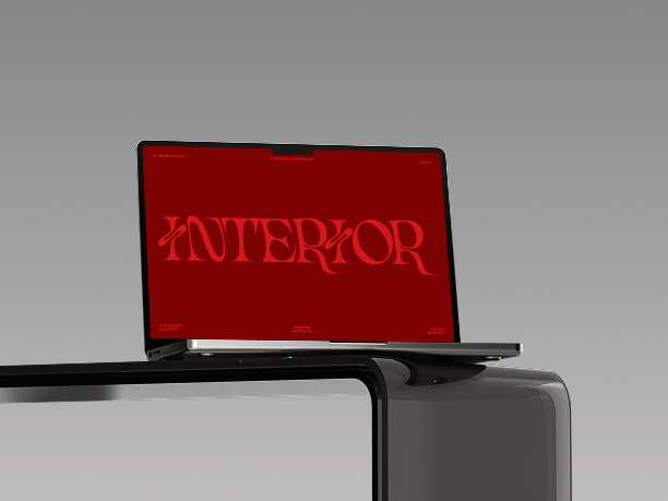 macbook mockup on sculpted metal stand