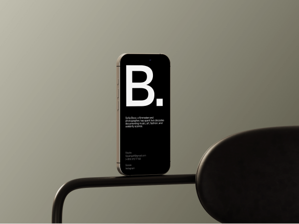iphone 16 mockup on a grey chair 2