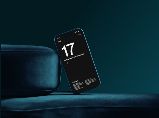 iphone 16 mockup on a blue sofa