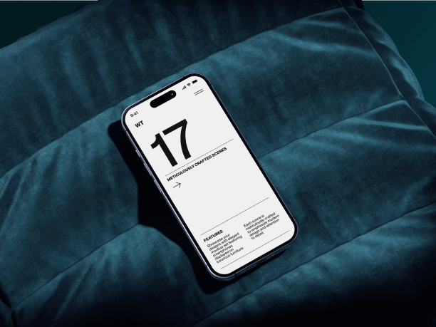 iphone 16 mockup on a blue sofa 2