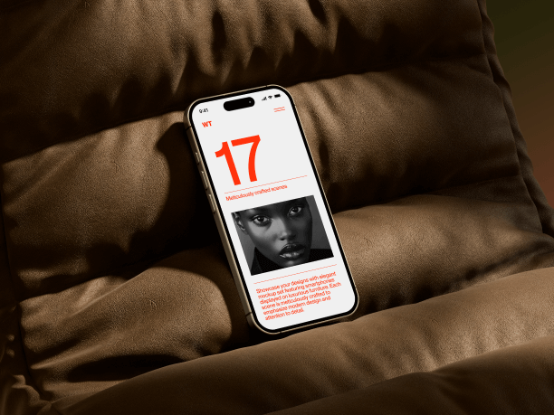 iphone 16 mockup on a blue sofa 3