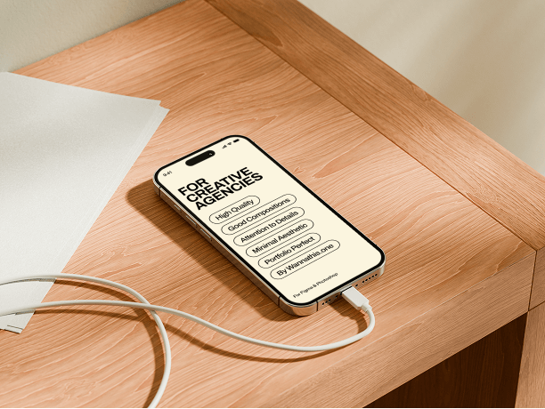 iphone mockup on wooden edge desk