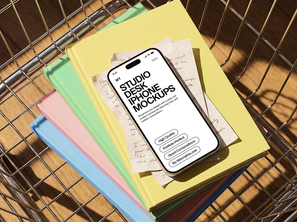 iphone mockup on stacked notebooks
