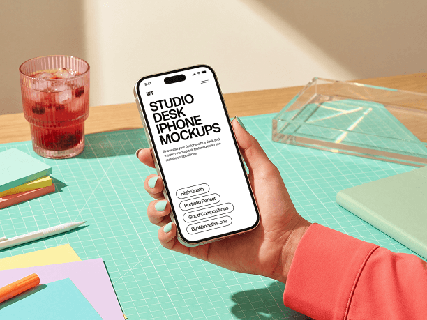 iphone mockup above creative desk setup