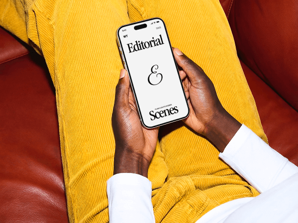 seated hands holding iphone close-up scene