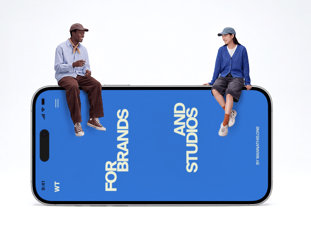 giant iphone mockup with two people seated