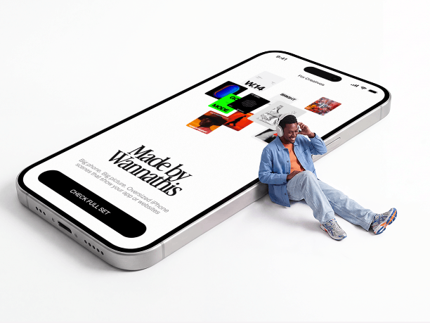 giant iphone mockup with someone seated beside