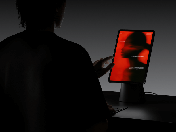 ipad mockup in hands with dark background