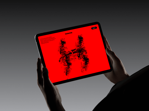 landscape ipad mockup in two hands dark background