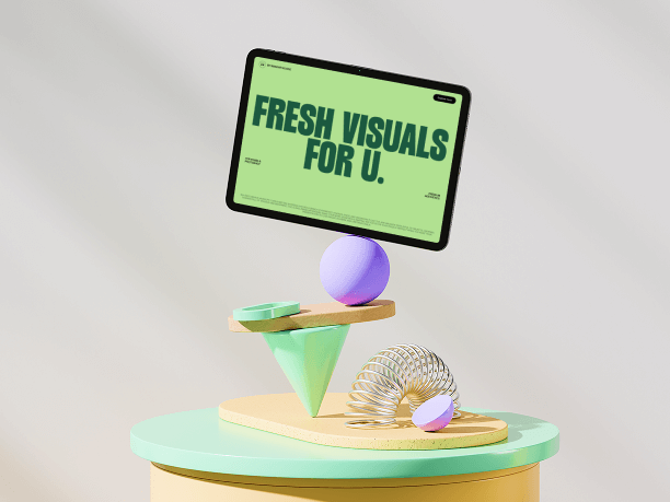 tablet mockup on playful balanced shapes
