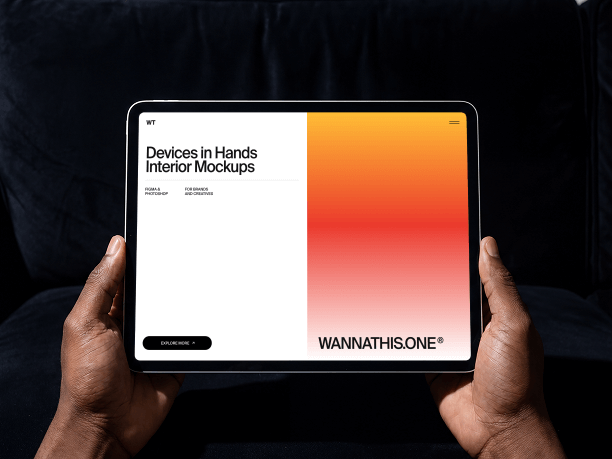 tablet mockup in hands on dark sofa